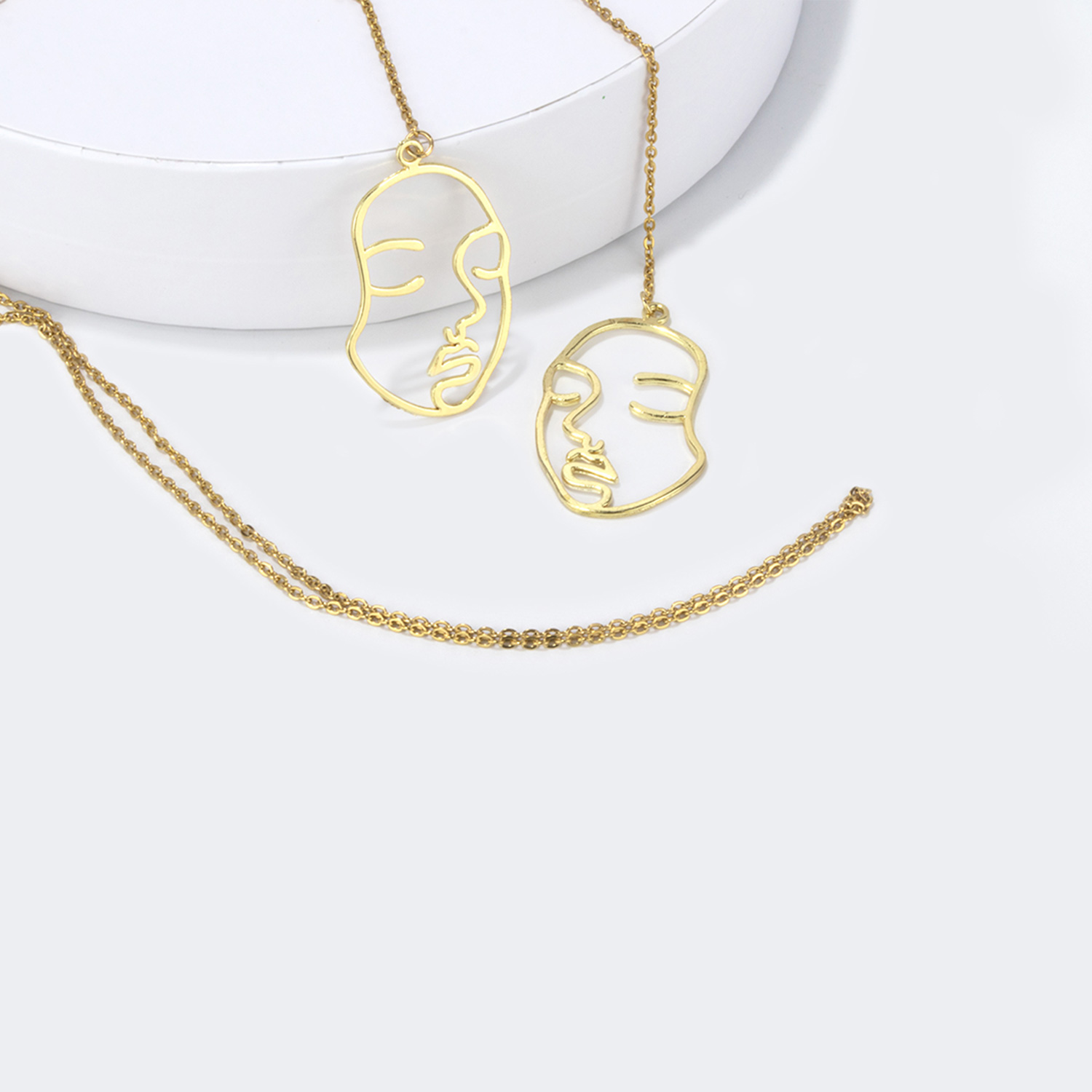 Abstract Human Face Eyeglasses Chain1